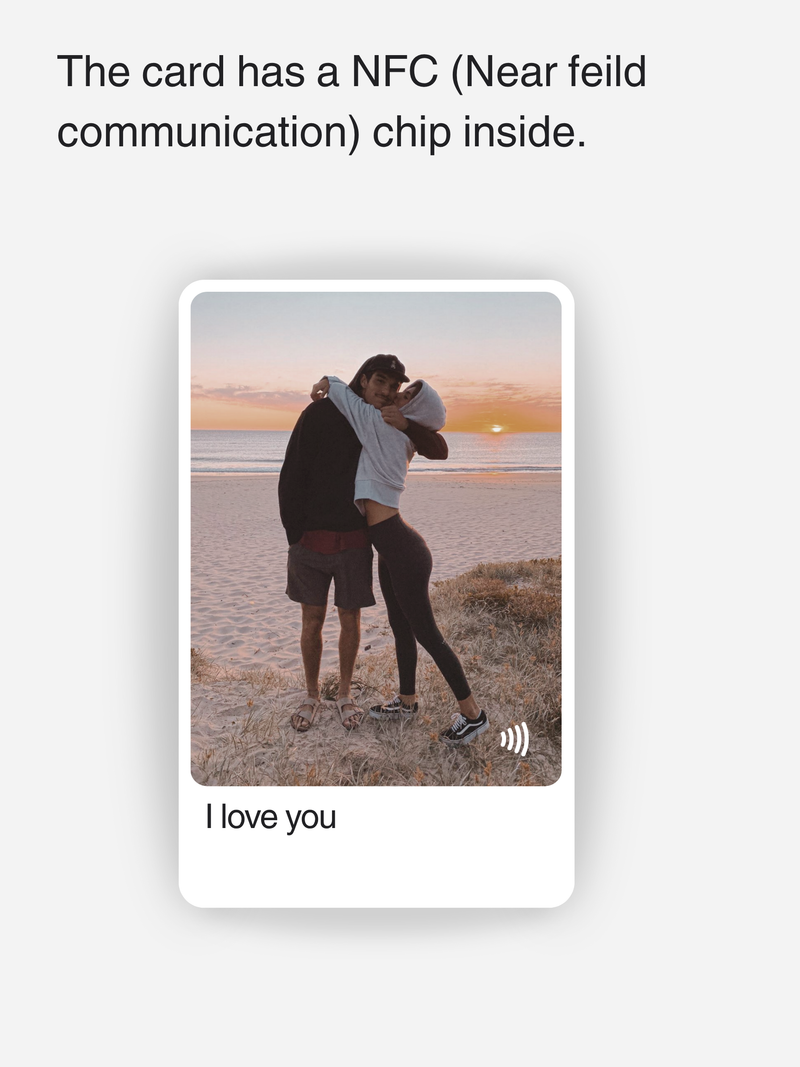 Personalized NFC card featuring a couple hugging at sunset with “I love you” text. The card has a NFC (Near Field Communication) chip inside.