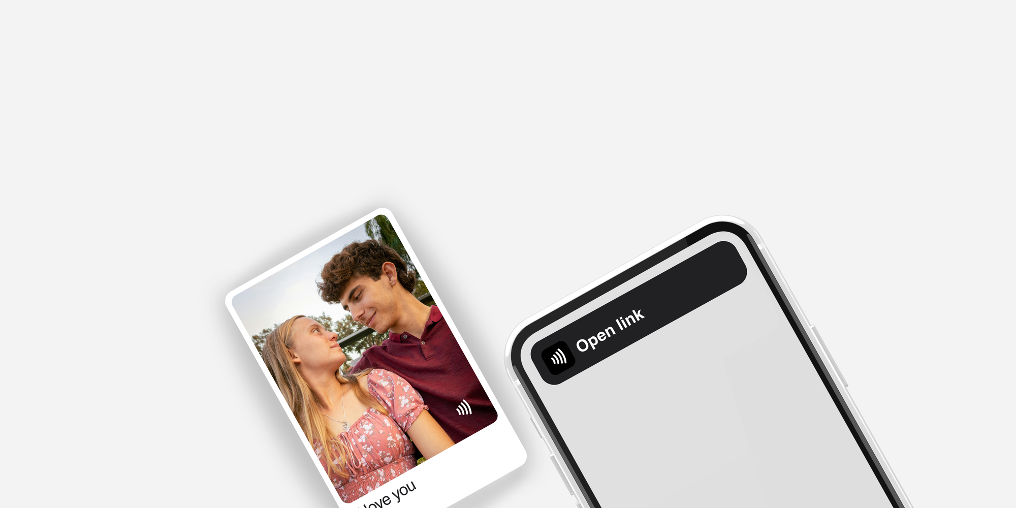 Solvor displaying a photo of a couple beside a phone with an “Open link” notification on a white background.